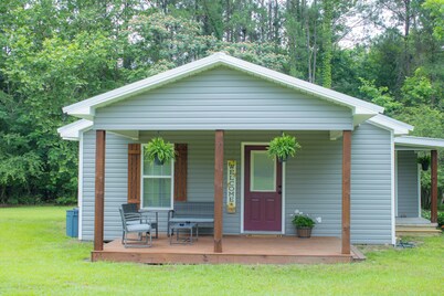 Cozy 2-bedroom house nestled among the trees and surrounded by open space.