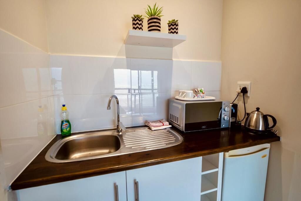 Suite - balkon - søudsigt | Privat køkken