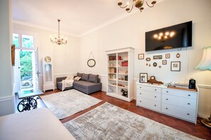 Habitación familiar | Área de sala de estar