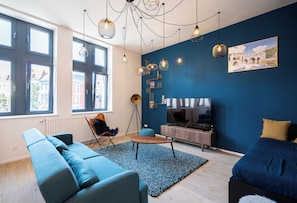 Apartamento conforto, 1 quarto, para não fumantes, vista para a cidade | Área de estar