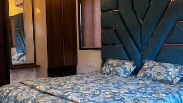 3 slaapkamers, een strijkplank/strijkijzer, beddengoed