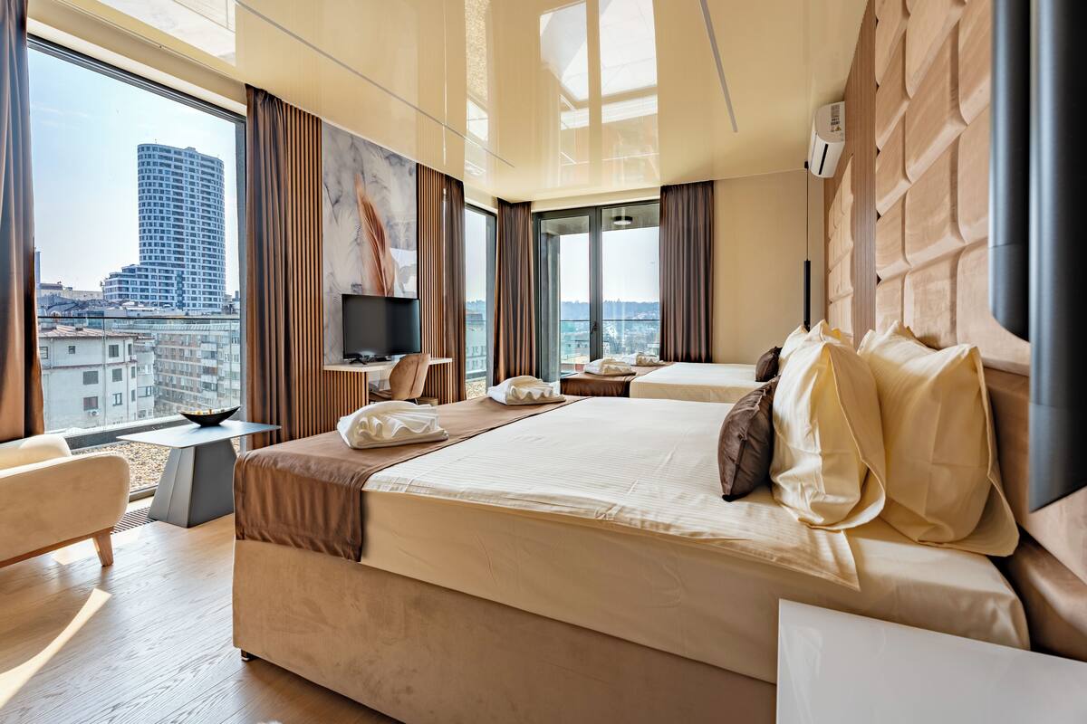 Deluxe Room, Balcony | Desk, laptop workspace, free WiFi