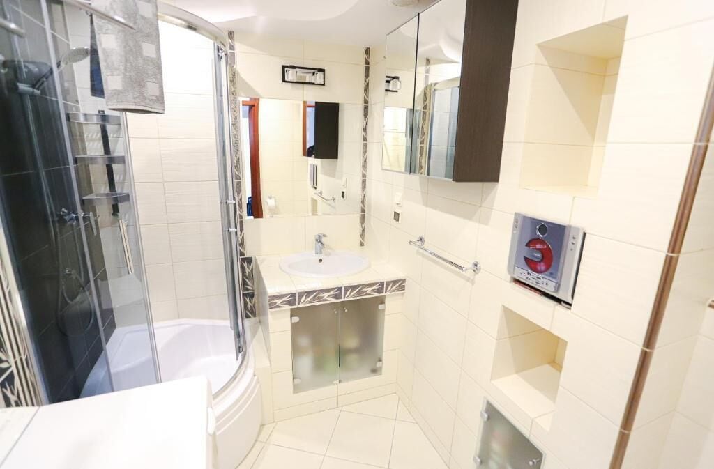 Apartment, Balcony, City View | Bathroom | Towels, soap