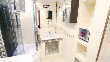 Apartment, Balcony, City View | Bathroom | Towels, soap