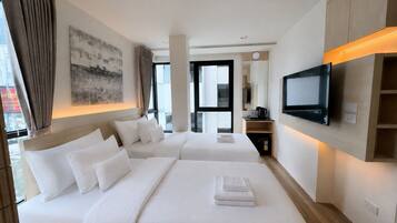 Premium bedding, down duvets, memory-foam beds, free minibar items