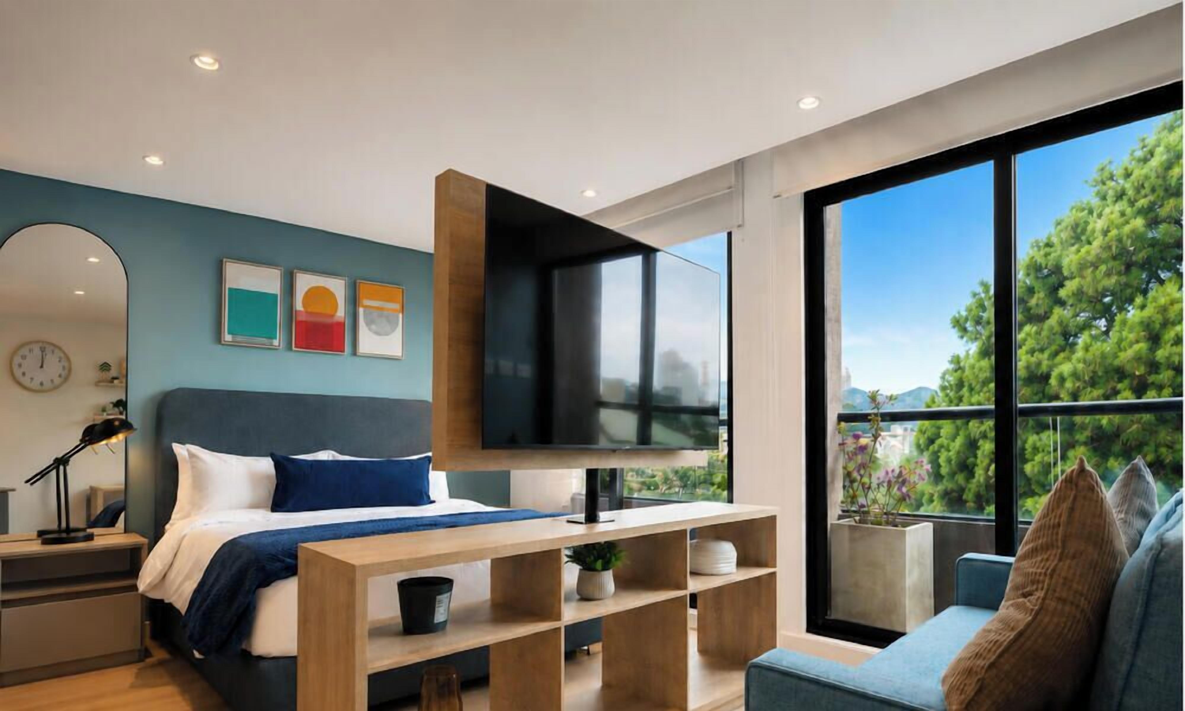 Deluxe Loft | Living area | 122-cm Smart TV with digital channels
