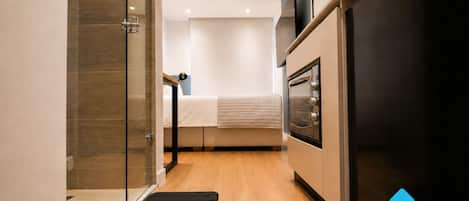 Condo, City View | In-room safe, laptop workspace, blackout drapes, iron/ironing board