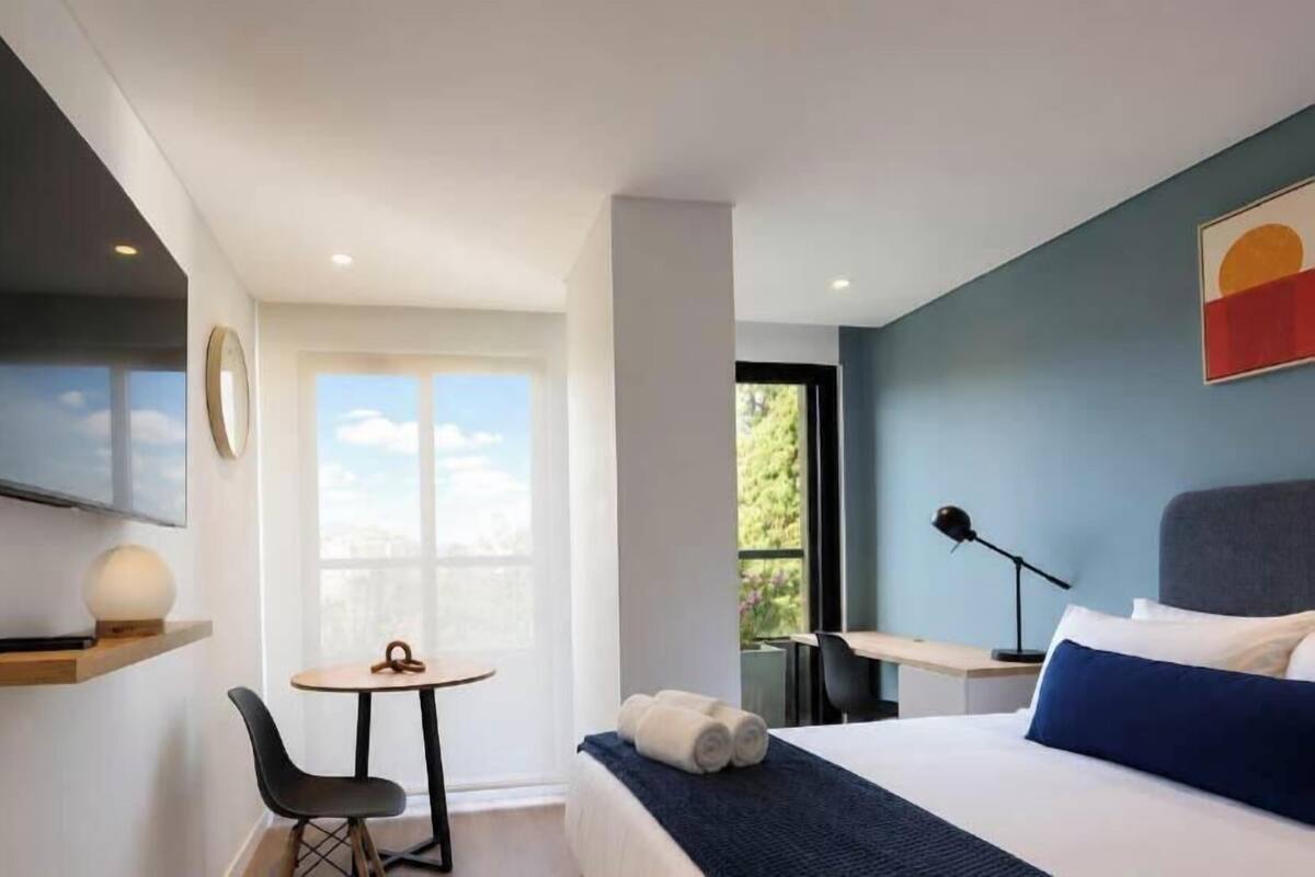 Junior Studio, City View | Premium bedding, in-room safe, blackout curtains, iron/ironing board