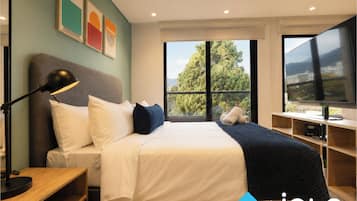 Premium bedding, in-room safe, laptop workspace, blackout curtains
