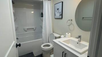 Hair dryer, towels, soap, toilet paper