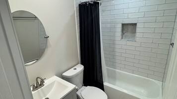 Hair dryer, towels, soap, toilet paper
