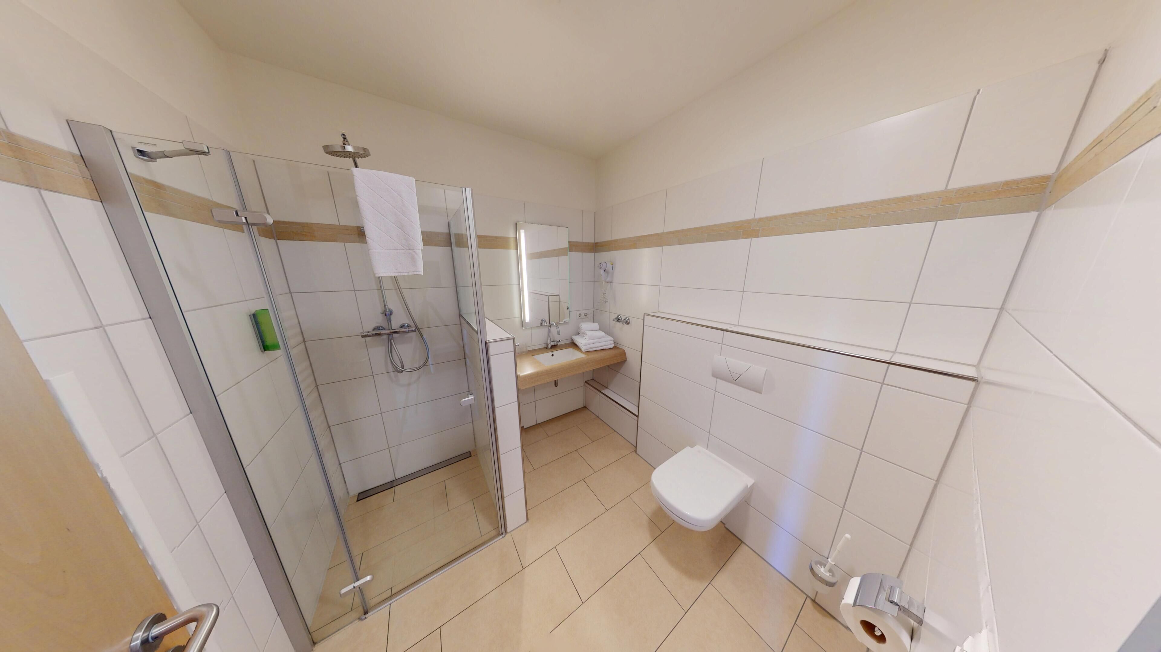 Deluxe Double Room, Patio | Bathroom | Shower, hair dryer, towels, soap