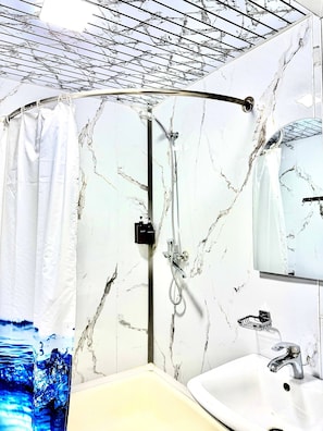 Twin Room, Lanai, City View | Bathroom | Separate tub and shower, free toiletries, hair dryer, slippers - Officers Boutique (Samarkand)