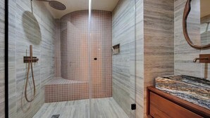 A modern bathroom with a shower, a vanity with a marble countertop, and a mirror. - JUST MOMENTS FROM ICONIC THE PICASSO MUSEUM, PLACE DES VOSGES - RUE DES ARCHIVES (Paris)