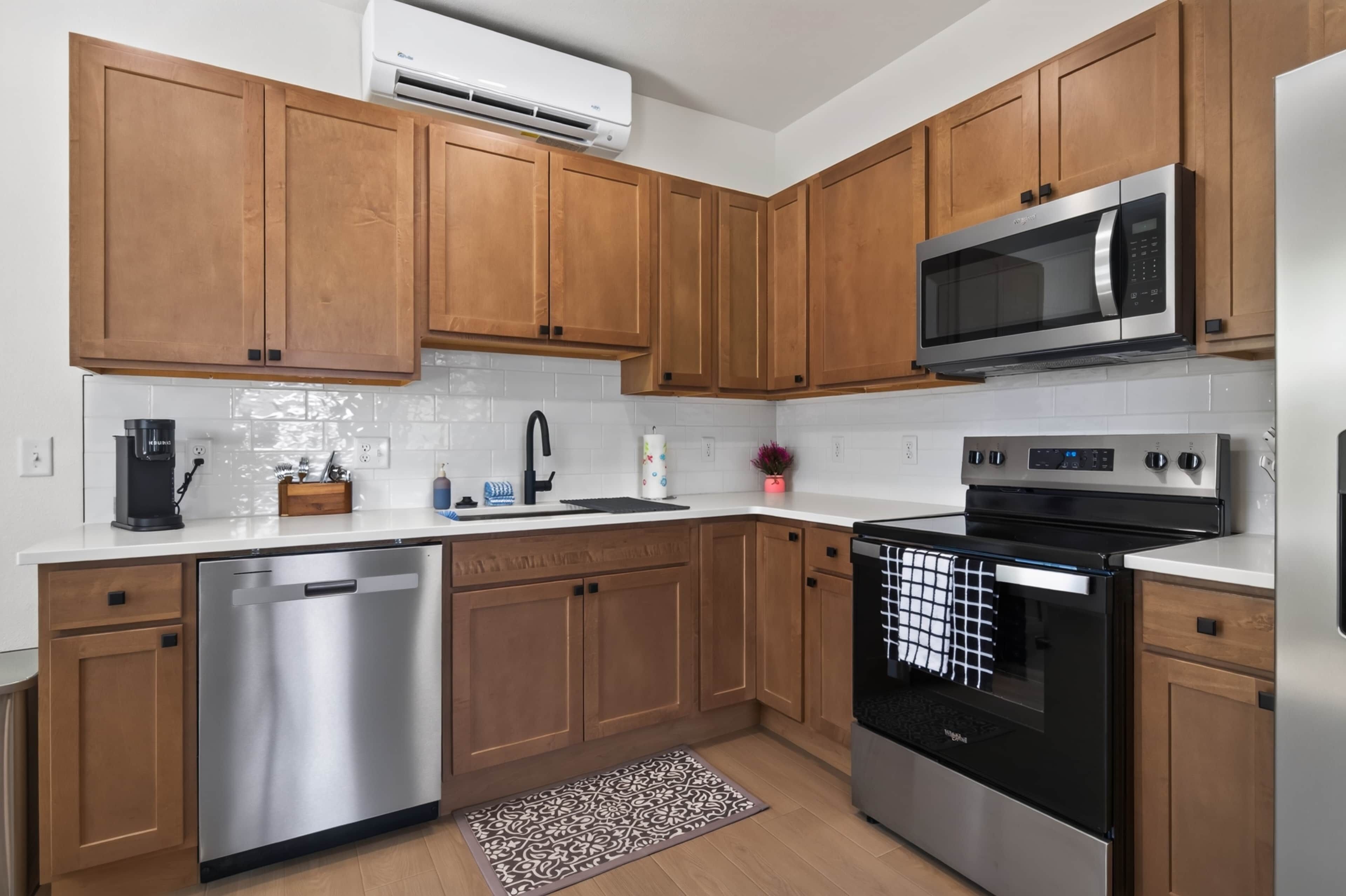 Coffee/tea maker, fridge, microwave, oven