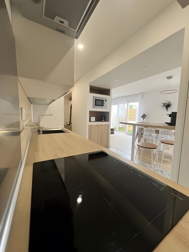 Appartement 'Chez Hugo' avec terrasse privée.