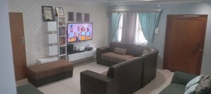 Living area - Peaceful 2-bedroom bungalow with AC in charming Gaborone (Gaborone)