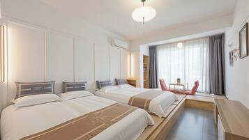 Premium bedding, individually decorated, individually furnished, desk