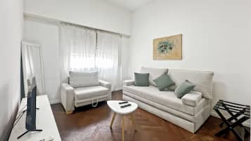 Apartamento, 1 quarto, vista para a cidade | Sala de estar