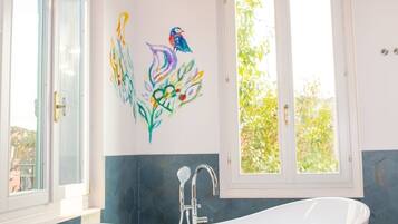 Luxury Double Room, Garden View | Bathroom | Hair dryer, slippers, towels, soap