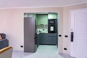 Deluxe Apartment, City View | Private kitchen - Exclusivo departamento en Las Condes (Las Condes)