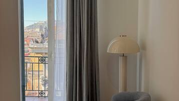 Studio Suite, City View | In-room safe, desk, blackout drapes, iron/ironing board