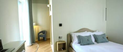 Studio Suite, City View | In-room safe, desk, blackout drapes, iron/ironing board