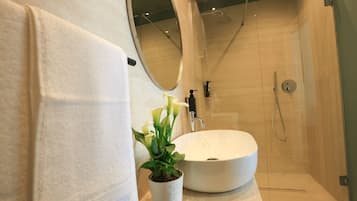 Deluxe Double Room, City View | Bathroom | Shower, hair dryer, slippers, towels