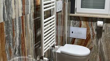 Hair dryer, towels, soap, shampoo