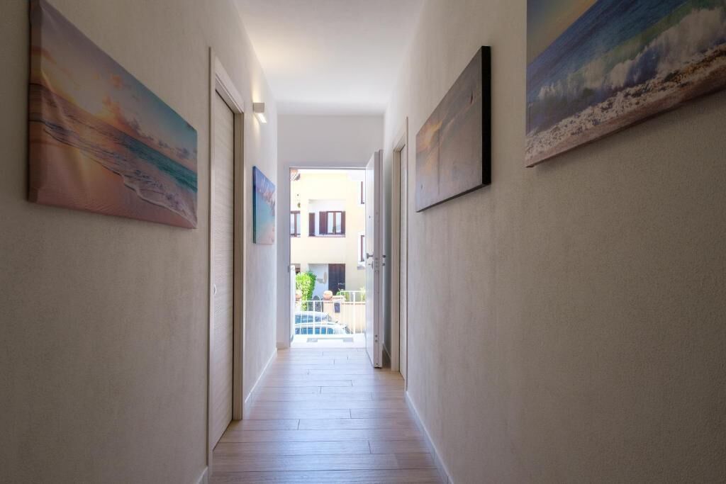 Deluxe-Dreibettzimmer, Balkon, Meerblick | Innenbereich
