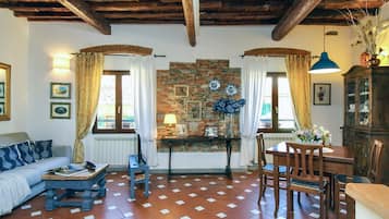 Apartment | Living area | 30-inch flat-screen TV with satellite channels