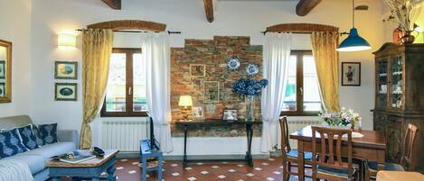 Apartment | Living area | 30-inch flat-screen TV with satellite channels