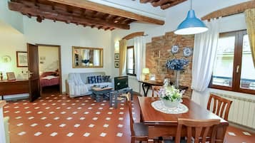 Apartment | Living room | 30-inch flat-screen TV with satellite channels