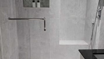 Shower, towels, soap, toilet paper