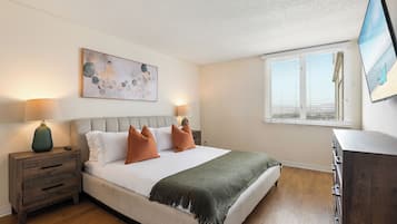 1 bedroom, desk, iron/ironing board, travel crib