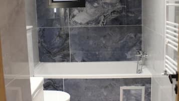 Shower, free toiletries, hair dryer, towels