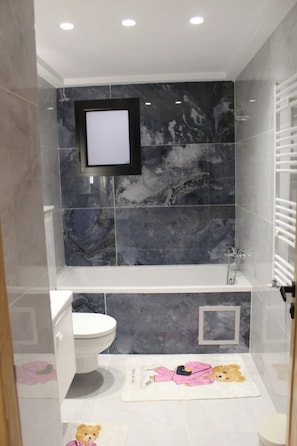 Shower, free toiletries, hair dryer, towels