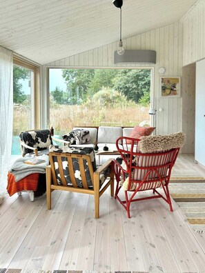 Living area - Modern black timber house on the Bjäre Peninsula (Båstad)