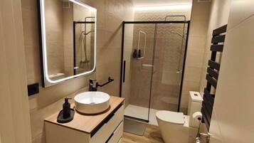 Hair dryer, towels, soap, toilet paper