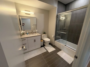 Shower, towels, toilet paper