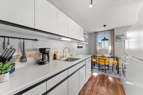 City View Getaway | 2BR • Pool • Gym • Parking