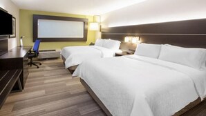 A hotel room with two beds, a desk, a chair, a TV, and a large window. - Cozy 1-bedroom, 2 queen bed, hotel suite with AC in soothing Downtown Ashville (Ashville)