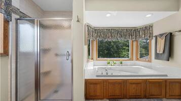 Jetted bath, hair dryer, towels, soap