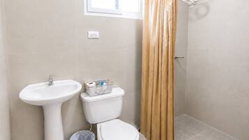 Comfort Single Room | Bathroom | Shower, towels, soap, shampoo