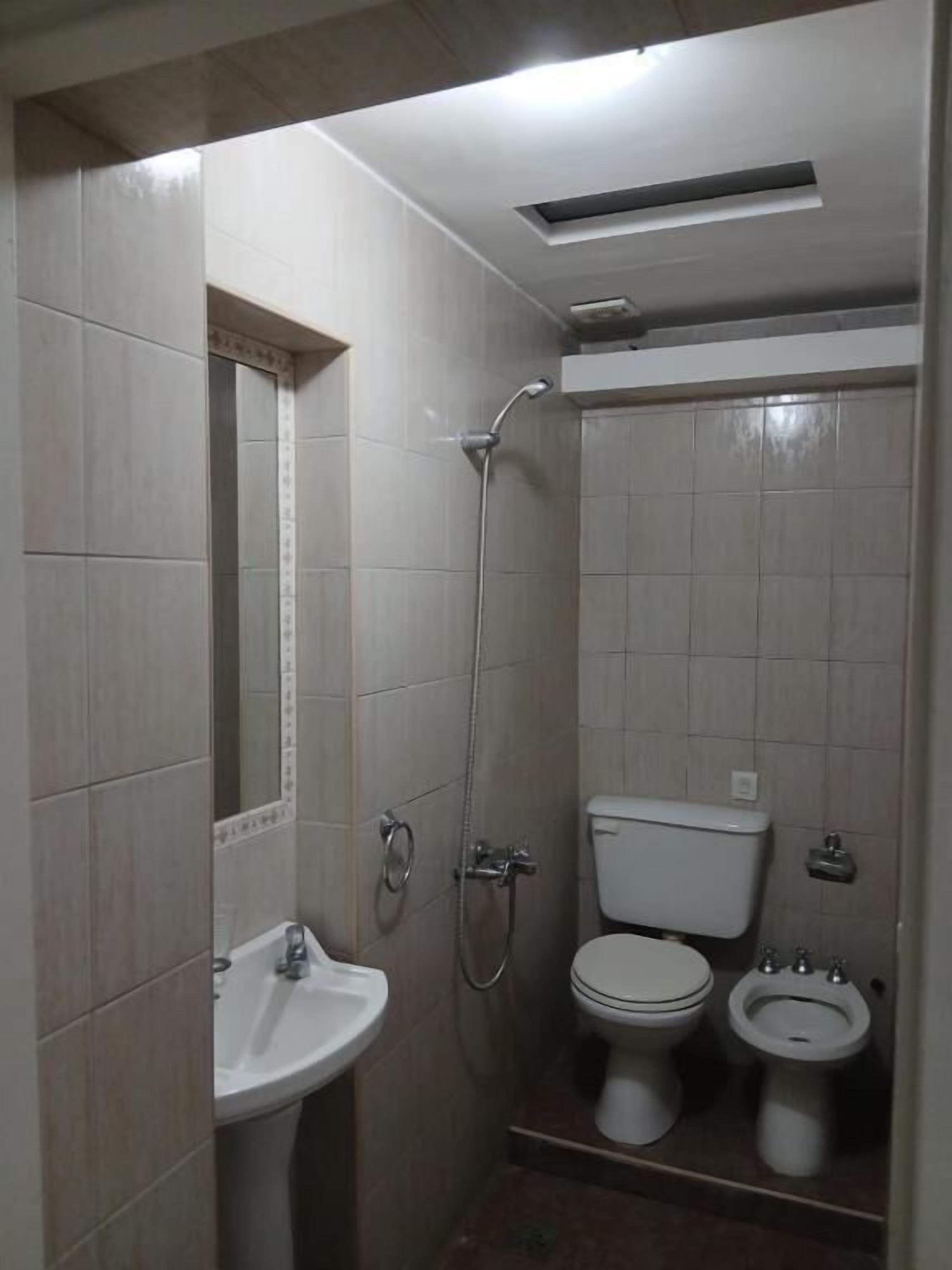 Shower, towels, toilet paper