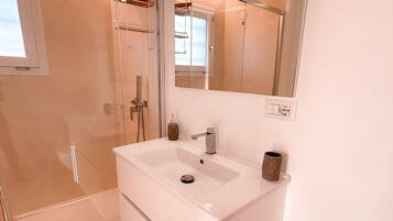 Deluxe Apartment, Private Pool, Garden View | Bathroom | Shower, hair dryer, towels, soap