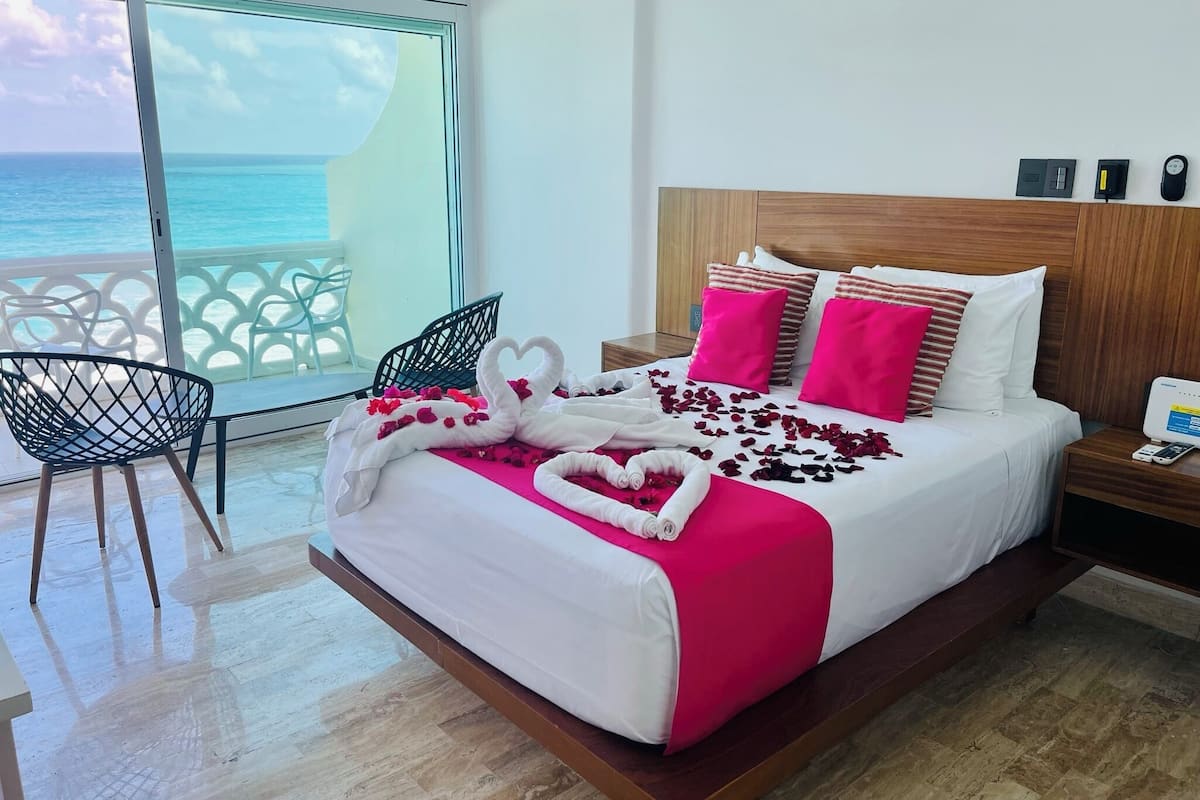 Premium bedding, memory-foam beds, in-room safe, laptop workspace