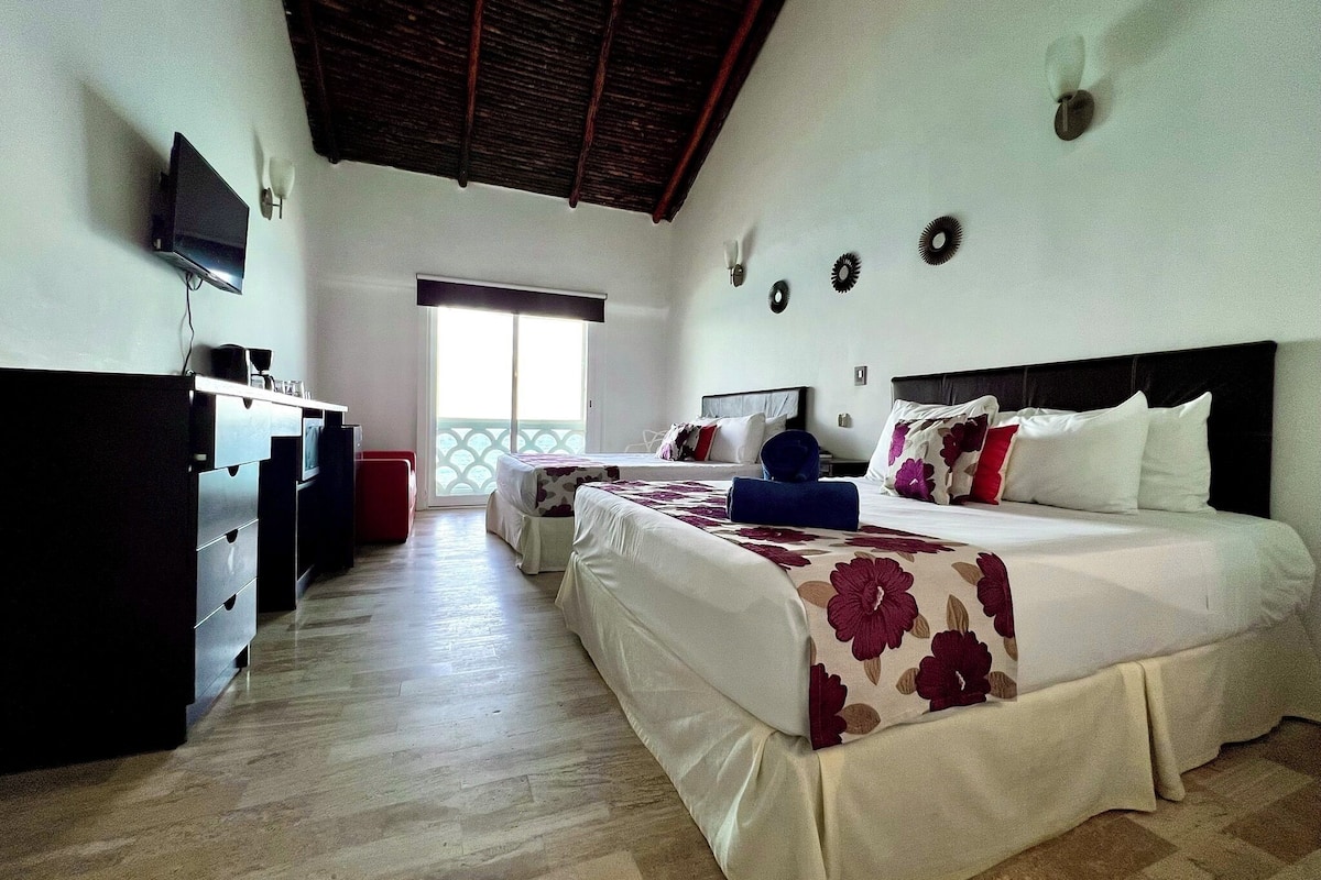 Quarto superior, vista para o oceano | Roupas de cama premium