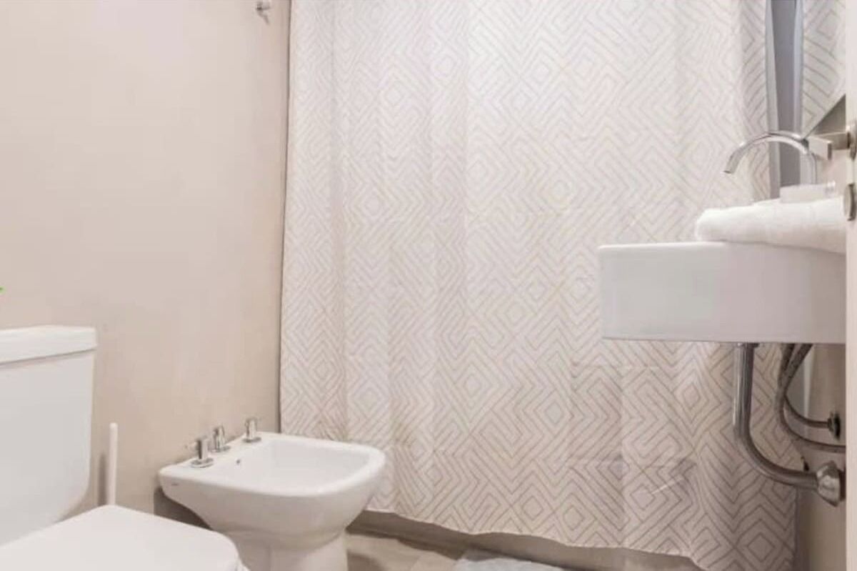 Shower, hair dryer, towels, shampoo