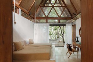 A room with a bed, a desk, and a hammock. - Jungle Villa - Retreats - Pool - Yoga (Tulum)